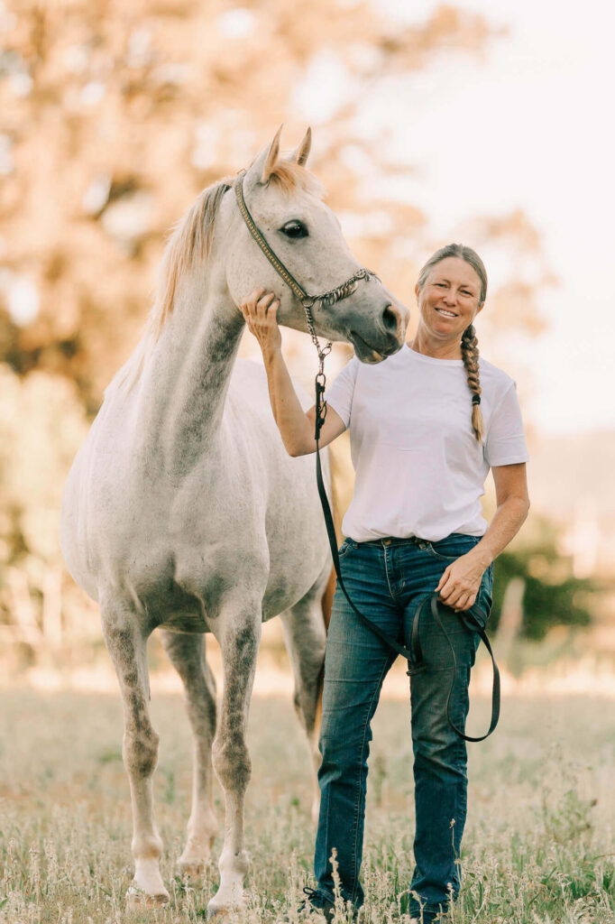 Arabian mare and owner sharing a moment by Trace Digital, a Brisbane equestrian and pet photographer
